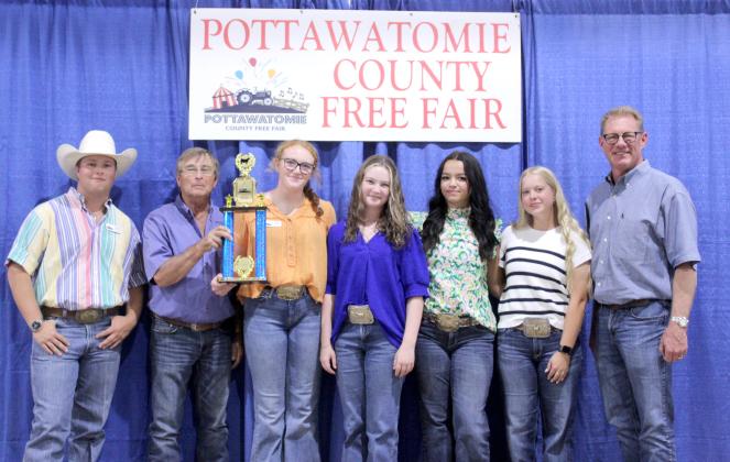 The Beef Herdsman Award, sponsored by the Pottawatomie County Cattlemen's Association, went to Bethel FFA and 4-H during the Pottawatomie County Free Fair Awards on Sept. 6. Shown, from left, are Cayden Carpenter, Fair Board member Lynn Marlow, Grace Loman, Taycie Baker, Makenzie Sullivan, Quinn Carpenter and Fair Board member Rex Anderson.