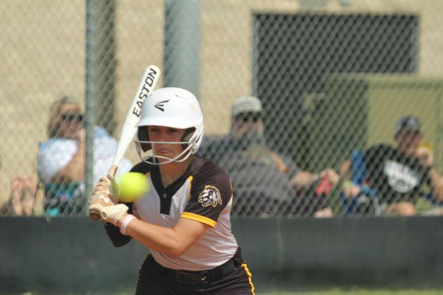 Tecumseh senior Cadence Leba passes on a ball before taking the walk on Sept. 4.