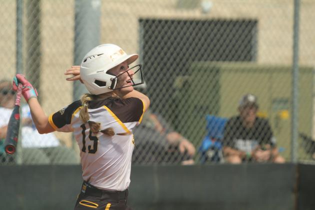 Tecumseh junior Jaylie Anderson gets a hit on Sept. 4. File photos by Natasha Dunagan, Countywide &amp; Sun.