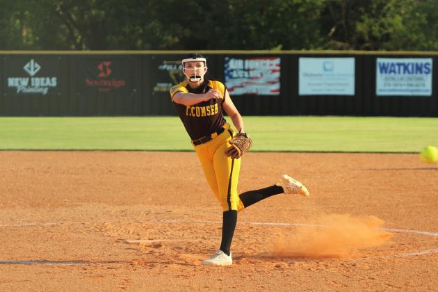 Tecumseh junior Jacee Townsend slings one over home during the home game with McLoud on Sept. 18. The Lady Redskins won, 3-7.