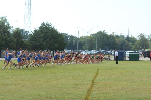 The high school girls take off from the starting line during the North Canadian River Conference Cross Country Meet, held at Tecumseh High School on Sept. 16. They included Bethel, Harrah, Mount St. Mary, McLoud, North Rock Creek, Jones and Tecumseh. Placing in the top three were Jones, Bethel and McLoud. There were 44 high school girls, and Jones junior Izzy Thompson placed first with a time of 13:34.41, followed by McLoud sophomore Ella Crouch in second with 14:12.55 &amp; McLoud senior Dawsen Branum in 3rd.