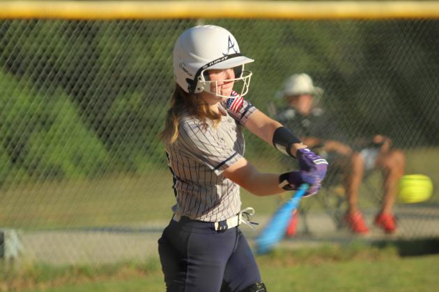 Asher senior Payton Madinger gets a hit during the home game against Wetumka on Sept. 22. The Lady Indians won that game, 8-0. They also won both of their Class B Fast Pitch District Tournament games with Maud on Sept. 25: 17-0 and 12-0.  Natasha Dunagan, Countywide &amp; Sun