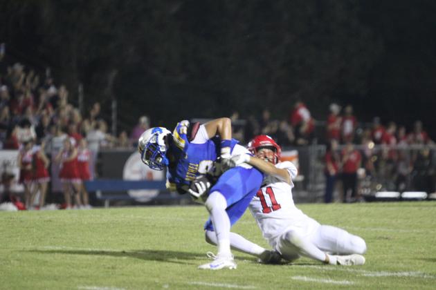 Bethel senior Zane Anderson tries to break free from a tackle during the home game against Prague on Sept. 26. The Wildcats won, 58-6. Natasha Dunagan, Countywide &amp; Sun