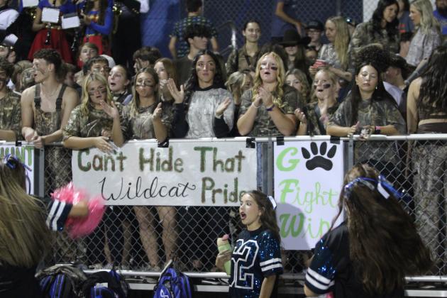 The Bethel High School Student Section decked out in camo for Military Night and clapped for the Wildcats during the home game against Kingston on Oct. 10.