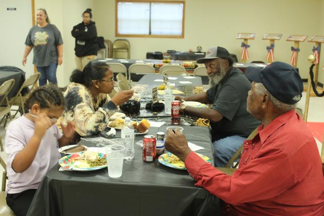 Ashaley Crawford talks with Brooksville Mayor Charles Carthen during the Brooksville 122nd Anniversary Celebration at the Brooksville Community Center on Oct. 18. Also shown are Aidyn Willingham, 7, and Leonard Phillips. Natasha Dunagan, Countywide &amp; Sun