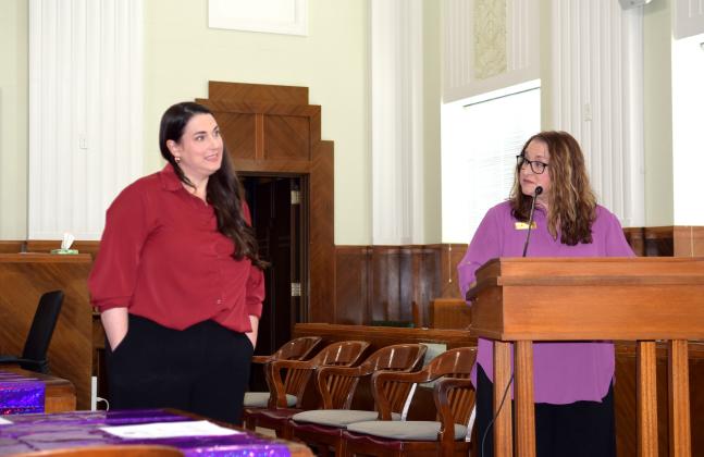 Project Safe CEO, Renee Clemmons talks about Vanessa Guinn with the Child Advocacy Center of Oklahoma, who was named Advocate of the Year  for Lincoln County at the annual Domestic Violence Awareness &amp; Awards Ceremony on Oct. 24.