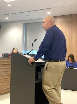 Tecumseh Superintendent Robert Kinsey addresses the County Commissioners.