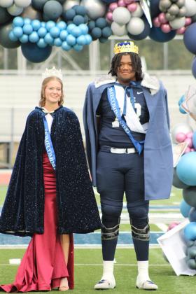 Representing Band, Drum Major Kiley Sartin was crowned Shawnee's Fall Homecoming Queen, and Football Player Ja'Qwon Evans was crowned Fall Homecoming King before the Oct. 23 game. The theme for Homecoming was "Once Upon a Pack." See full cutline below.