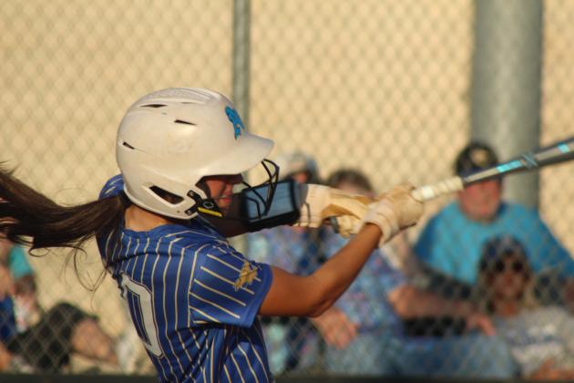 Bethel senior Layla Menhusen hits a double and gets one run batted in during the game at Tecumseh on Sept. 23. The Lady Wildcats won, 9-3.