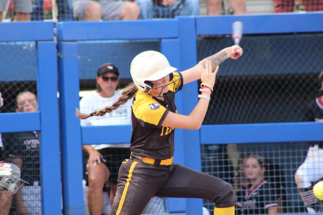 Tecumseh junior Madison Gray gets a hit in the seventh inning of the Class 4A Fast Pitch State Quarterfinal game against Tuttle, held at Devon Park in OKC on Oct. 16. The Lady Savages lost, 0-5, but ended the season ranked sixth with a 29-10 record.