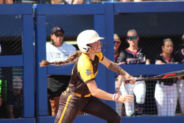Tecumseh junior Madison Gray gets a hit in the sixth inning of the Class 4A Fast Pitch State Quarterfinal game against Tuttle, held at Devon Park in OKC on Oct. 16. The Lady Savages lost, 0-5, but ended the season ranked sixth with a 29-10 record.
