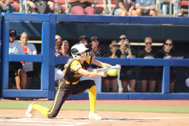 Tecumseh junior Haley Mansell hits a bunt in the fourth inning of the Class 4A Fast Pitch State Quarterfinal game against Tuttle, held at Devon Park in OKC on Oct. 16. The Lady Savages lost, 0-5, but ended the season ranked sixth with a 29-10 record.