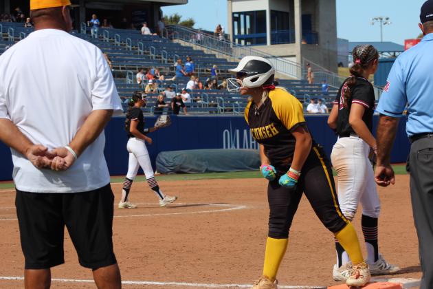 Tecumseh junior Embrie Smith roars her excitement after stepping on first base in the seventh inning of the Class 4A Fast Pitch State Quarterfinal game against Tuttle, held at Devon Park in OKC on Oct. 16. The Lady Savages lost, 0-5, but ended the season ranked sixth with a 29-10 record.