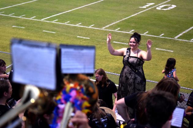 Queen Candidate and Drum Major Cheyanna Dietz leads the band during the Homecoming game agains Harrah. Julie Talton, Countywide &amp; Sun