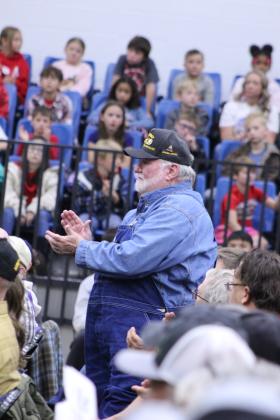 U.S. Army Veteran Jerry Duff is recognized and claps for his fellow veterans during the program at Bethel High School on Nov. 11. His son, Patrick Duff, was also in the Army. Patrick's wife, Raven, is a reading specialist for BPS and their son Tanner is in fourth grade.