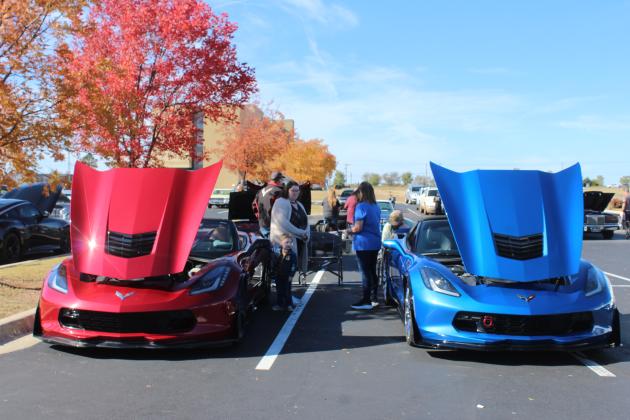 A pair of convertible Corvettes (2014, left, and 2015) owned by George Benard of Shawnee were among the 66 entries in the car show.
