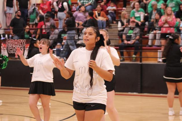 Earlsboro High School Cheerleaders Avaleigh Fields, Natalie Allen and others rally the crowd between the first and second quarters of the Nov. 7 boys' home game against Varnum.
