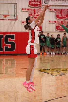 Earlsboro's Lilly Gentry tries for a three-pointer during the fourth quarter of the Nov. 7 home game against Varnum. The Lady Wildcats lost 39-50.