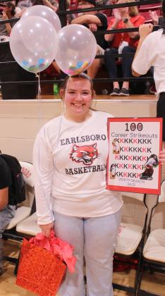 Earlsboro pitcher Abby McAlister was honored during the Nov. 7 boys basketball game for making 100 career strikeouts during the fast-pitch softball season. McAlister helped lead the Lady Wildcats to a 24-12 record.