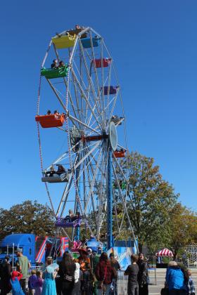 A ferris wheel was one of the attractions at the Shawnee Fall Fest at Woodland Veterans Park on Nov. 1. It was free to the public, as was the zipline, petting zoo, face painting, balloon creations and costume contests. The ferris wheel was rented from Ferris Wheel Rent in South Carolina courtesy of Pottawatomie County, Absentee Shawnee Tribe, Bison Federal Credit Union, Danfoss Power Solutions, Bison Metal Technologies and Citizen Potawatomi Nation. More than 1,400 people rode the ferris wheel.
