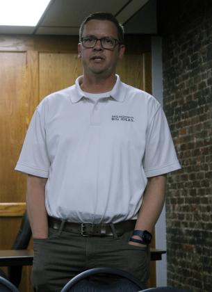 During the Shawnee Board of Education Special Session on Nov. 20, Matthew Radclif, with MASS Architects, answers a question posed by Shawnee School Board member Russ Oliver about how they plan to prevent flooding at the future Stucker Event Center. Natasha Dunagan, Countywide &amp; Sun
