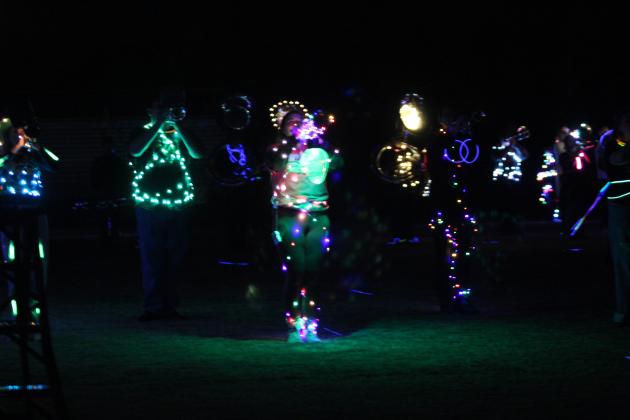 The horn section of the Tecumseh Savage Pride Band performs the light show version of their "On Broadway" program during the Veteran's Day event on Nov. 11 at the THS football field. Last year, they added fireworks. This year they invited the Meeker and North Rock Creek High School bands to join them. They played individually, then joined together for the patriotic finale.