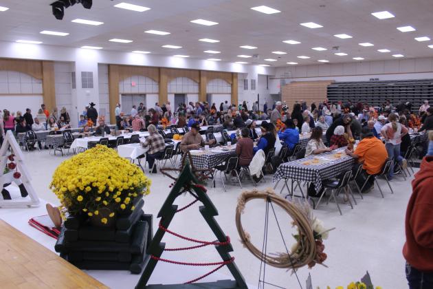 Tecumseh FFA held their annual Pig Roast on Nov. 21 at the THS Alumni Center, which included a silent and live auction. Some auction items created by students can be seen in the foreground. FFA Advisor Mara Carmen said they sold 225 tickets for the fundraiser. Photos by Natasha Dunagan, Countywide &amp; Sun