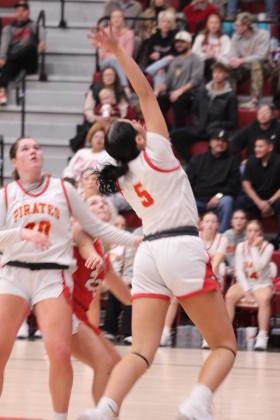 Dale junior Kynlee Bullard throws up a shot in the third quarter of the game against Washington in the Dale Boomarang Basketball Classic on Dec. 13.