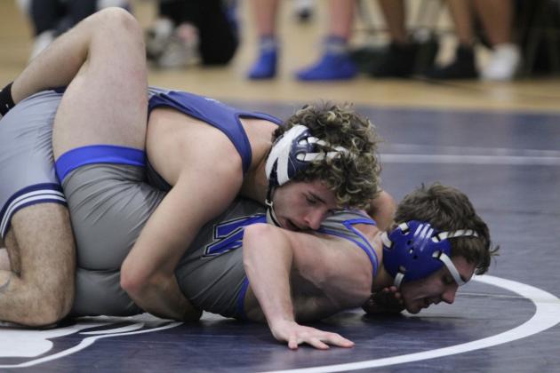 In the 138 weight class, Shawnee's Ethan Soliz tries to wear down his Newcastle challenger during the Shawnee High School Boys Dual on Dec. 2. The Wolves won the meet, 46-36.