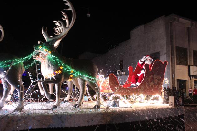Santa Claus rides in his sleigh pulled by nine beautiful reindeer in the Shawnee Parade of Lights on Dec. 12. Santa and fireworks rounded out the two-hour parade with 117 entries.