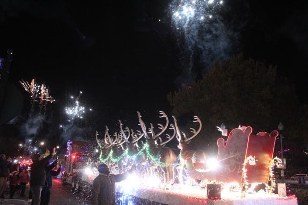 Santa Claus rides in his sleigh pulled by nine beautiful reindeer in the Shawnee Parade of Lights on Dec. 12. Santa and fireworks rounded out the two-hour parade with 117 entries.