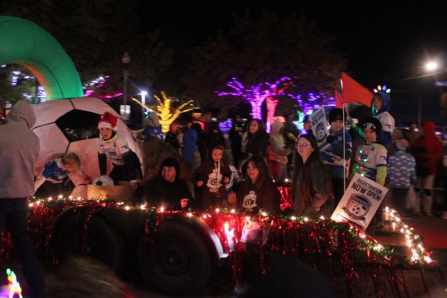 The Shawnee Soccer Association float featured a giant soccer ball and lots of kids and parents in the Shawnee Parade of Lights along Main Street on Dec. 12. According to State Representative Dell Kerbs, with Safe Events for Families, there were 117 entries in the two-hour parade.
