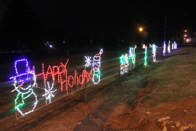 Lights along the fence at Slick Humphrey Park in Tecumseh have told drivers on Highway 9 "Happy Holidays" since 2011, when they were installed, according to Tecumseh City Clerk Cathy Condit.