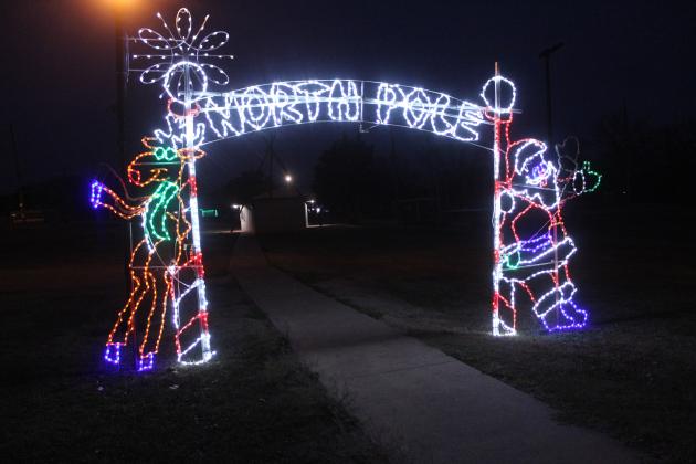 An arch with Santa and a reindeer declares Slick Humphrey Park in Tecumseh as the "North Pole." The arch has been part of the Christmas light display since 2011, said Tecumseh City Clerk Cathy Condit.