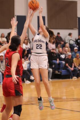 Asher's Makenah Templeton shoots for the hoop in the third quarter of the Jan. 16 home game against Vanoss.