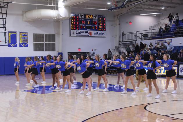 The Bethel High School Cheerleaders and Pom Squad perform during halftime of the Jan. 20 Wildcats home game against Dale.