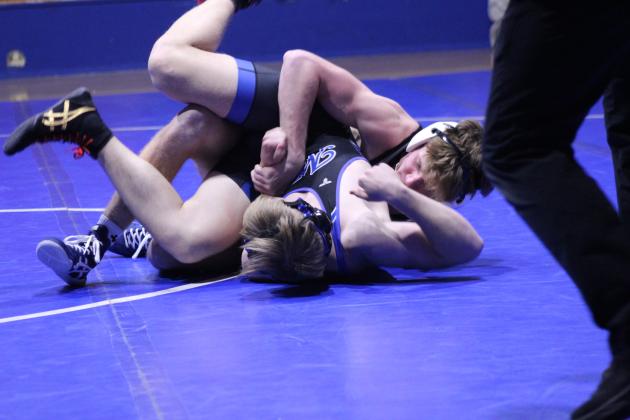 Bethel senior Zac Griffith fips a Mount St. Mary's wrestler during the Bethel Tri-Dual and Senior Night on Jan. 20 and wins with a tech fall. The Wildcats also faced the Star Spencer wrestlers.