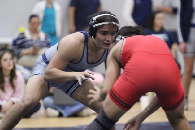 Shawnee's Jaxon Shawnee looks for an opening to take his opponent down. Natasha Dunagan, Countywide &amp; Sun