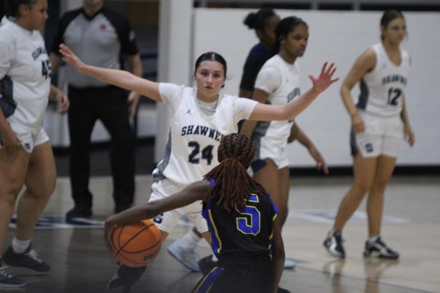 Shawnee senior Daley Rice guards the basket during the Jan. 6 home game against Will Rogers. The Lady Wolves won 46-26, and the Wolves followed suit, 82-25. Natasha Dunagan, Countywide &amp; Sun