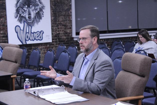 Jeff Jenkins, from Jenkins &amp; Kemper, CPA, PC, presents the annual audit report to the Shawnee Board of Education during the Jan. 12 meeting. Natasha Dunagan, Countywide &amp; Sun