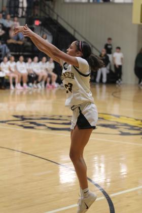 Tecumseh junior Anniah Phillips tries for a basket in the Jan. 6 home game against Seminole. The Lady Savages beat the Lady Chieftains 59-33, as did the Savages later, 97-62. Natasha Dunagan, Countywide &amp; Sun