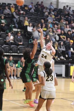 Tecumseh sophomore Lilie Tracy aims for the bucket in the Jan. 6 home game against Seminole. The Lady Savages beat the Lady Chieftains 59-33, as did the Savages later, 97-62. Natasha Dunagan, Countywide &amp; Sun