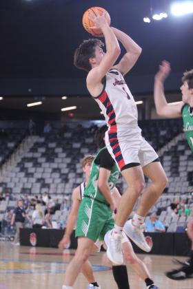 Asher's Hudson Skender puts up a jump shot in the first quarter of the Class B2 State Quarterfinal game against Leedey on March 3 at the OG&amp;E Coliseum in OKC. The Indians lost, 42-52, and they end their season with a record of 24-7.