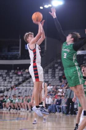Asher's Andrew Overstreet makes a bucket in the fourth quarter of the Class B2 State Quarterfinal game against Leedey on March 3 at the OG&amp;E Coliseum in OKC. The Indians lost, 42-52, and they end their season with a record of 24-7.