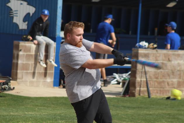 Recent graduate Jason Bailey makes a hit during the Annual Bethel Baseball Alumni Game on Feb. 28.