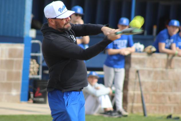 Former assistant baseball coach and athletic director, Bethel Middle School Principal Kyle Childers makes contact with the ball during the Annual Bethel Baseball Alumni Game on Feb. 28.