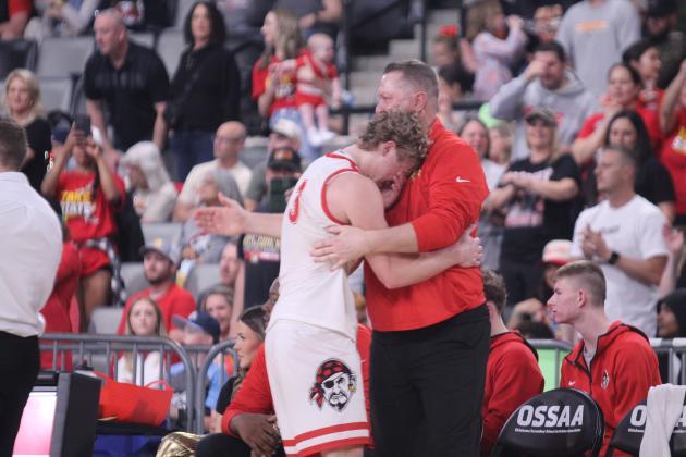 Dale senior Denton Forsythe exits the court for his final time in high school and gets a hug from his father, Assistant Coach Josh Forsythe. D. Forsythe was the MVP for the Class 2A State Tournament, after making 84 points in three games. The Pirates won for the fifth straight year.