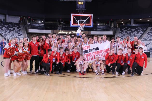 The Dale Pirates Basketball Team, Cheerleaders, Head Coach Fletcher Reed, Assistant Coach Oliver Willis and Assistant Coach Josh Forsythe pose after winning their fifth straight Class 2A State Championship at the OG&amp;E Coliseum on Mar. 14. See the story and more photos under Sports tab, or click on the camera banner below to see all of our photos from the game! Natasha Dunagan, Countywide &amp; Sun
