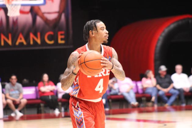 Potawatomi Fire Guard Chuck Guy looks for an opening to pass. Guy is The Basketball League's two-time MVP. Photos by Natasha Dunagan, Countywide &amp; Sun. Click on the camera banner ad below to see all the photos from the game!