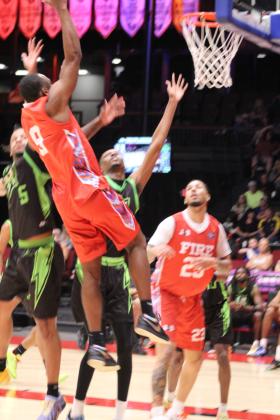 Potawatomi Fire Guard/Forward Cameron Williams shoots for the hoop in the second quarter of the March 20 home game against the Little Rock Lightning. The Fire won, 121-96, making their record for the season 4-0, according to www.potawatomifire.com.